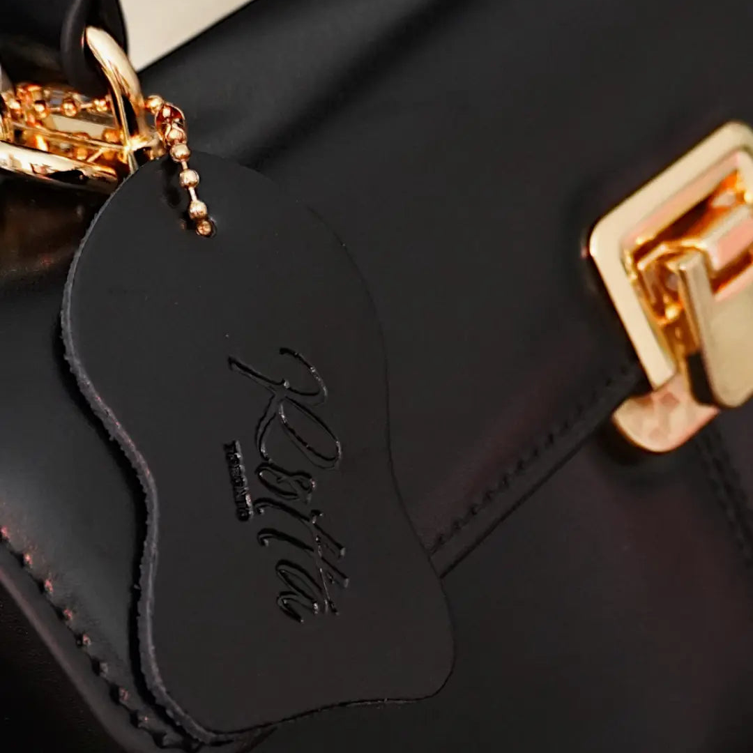 genuine leather bag Lumis genuine leather bag Lumis logo