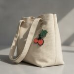 Home cherry pop bag charm